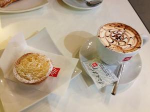 A typical breakfast: cappuccino and a rice pastry (surprisingly good). 